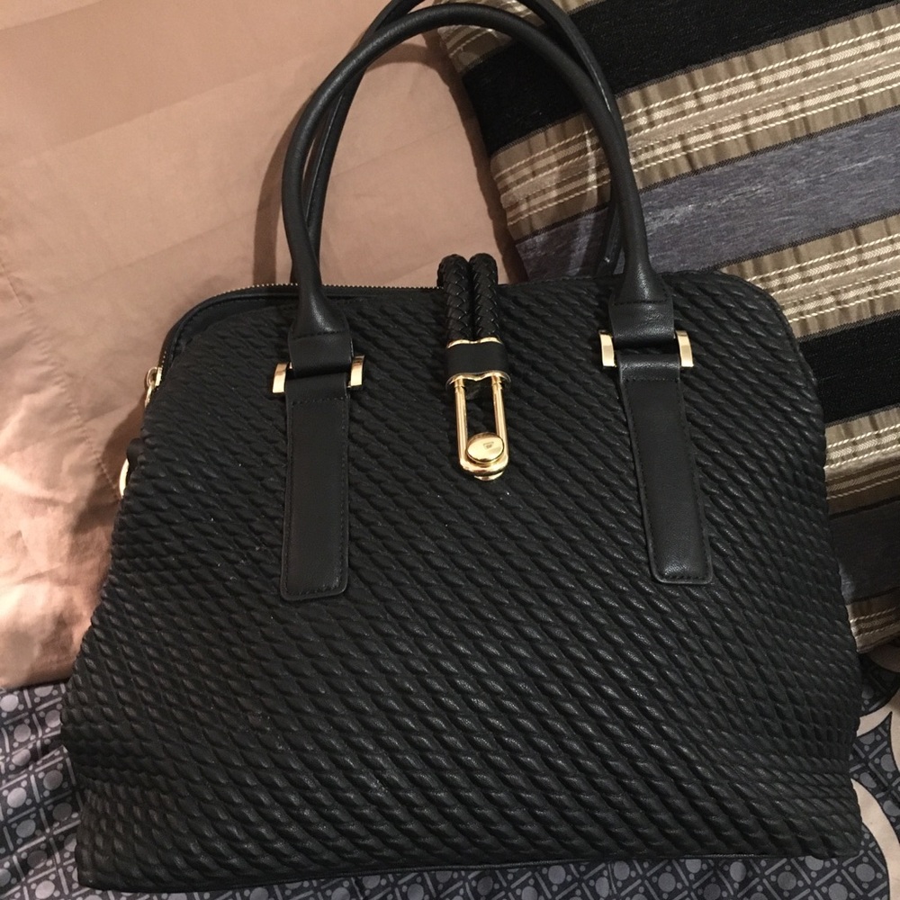 Stylish multi-compartment handbag
